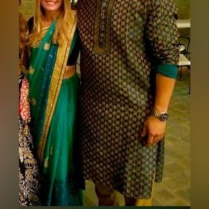 Worn once for Indian wedding. Female is size small and male is size large